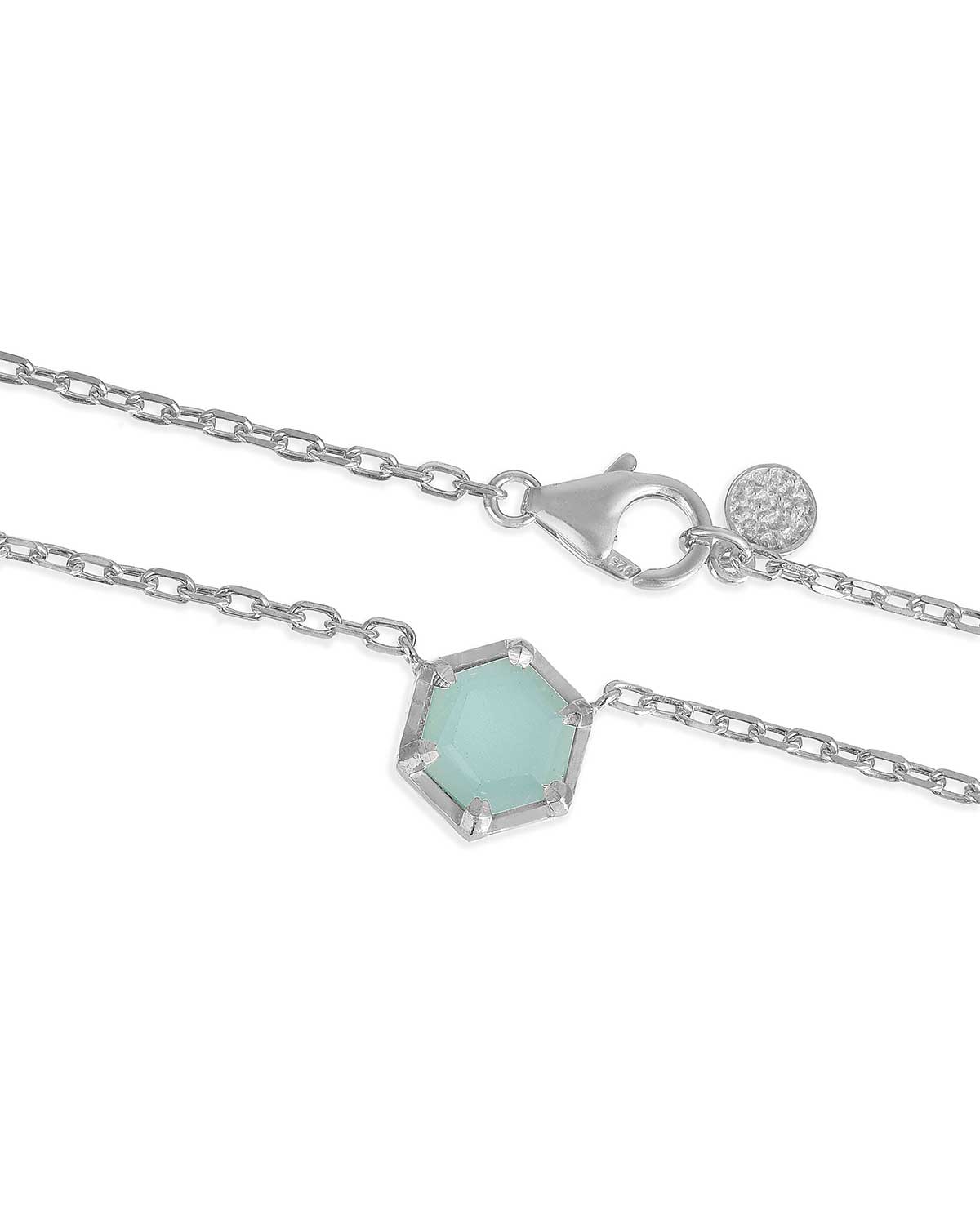 Silver bracelet with a half faceted aqua chalcedony gemstone detail
