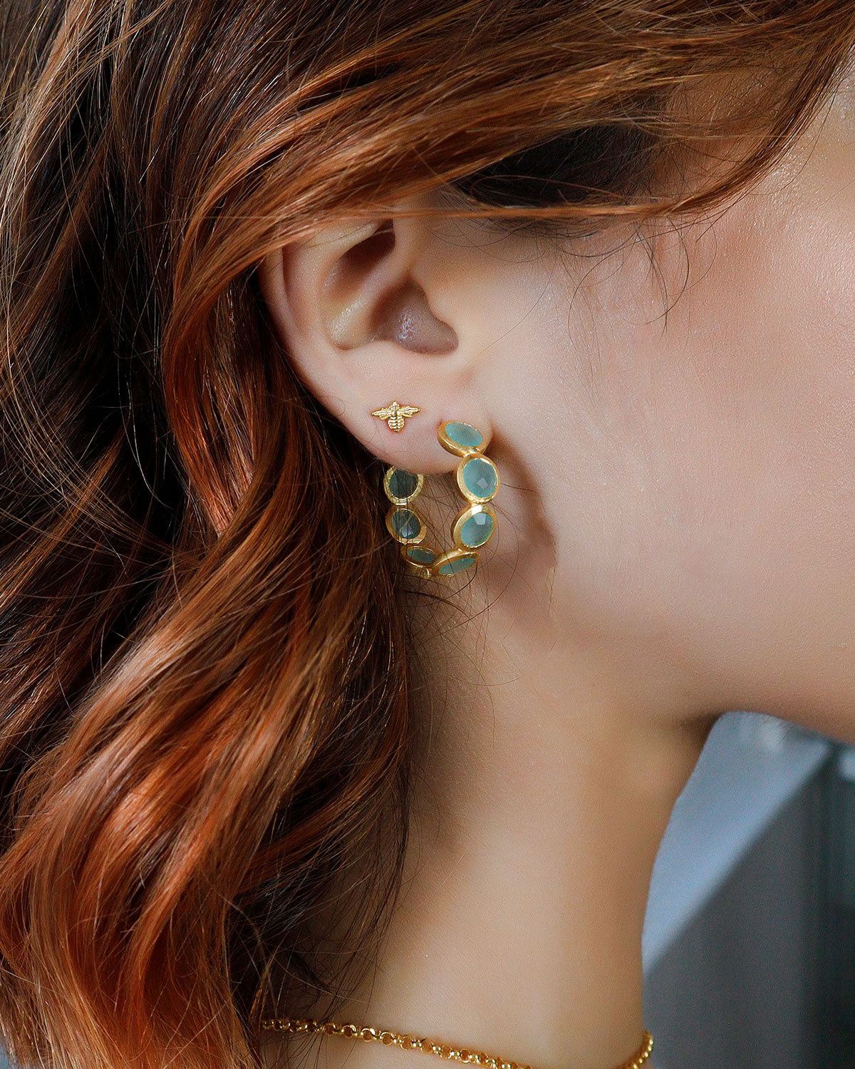 Comfortable mini gold bee stud earrings with screw-back closure for sleeping