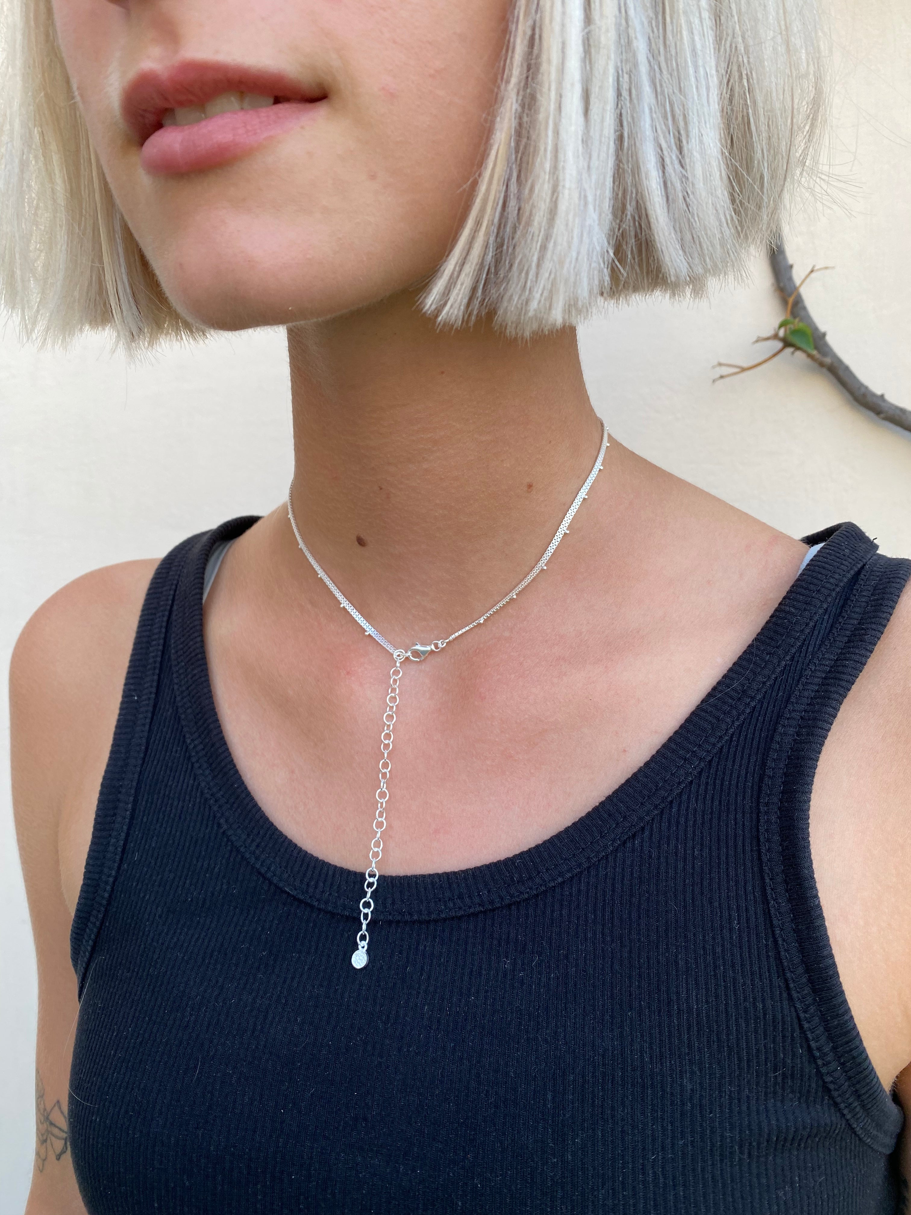 Lightweight sterling silver necklace with a simple bead design
