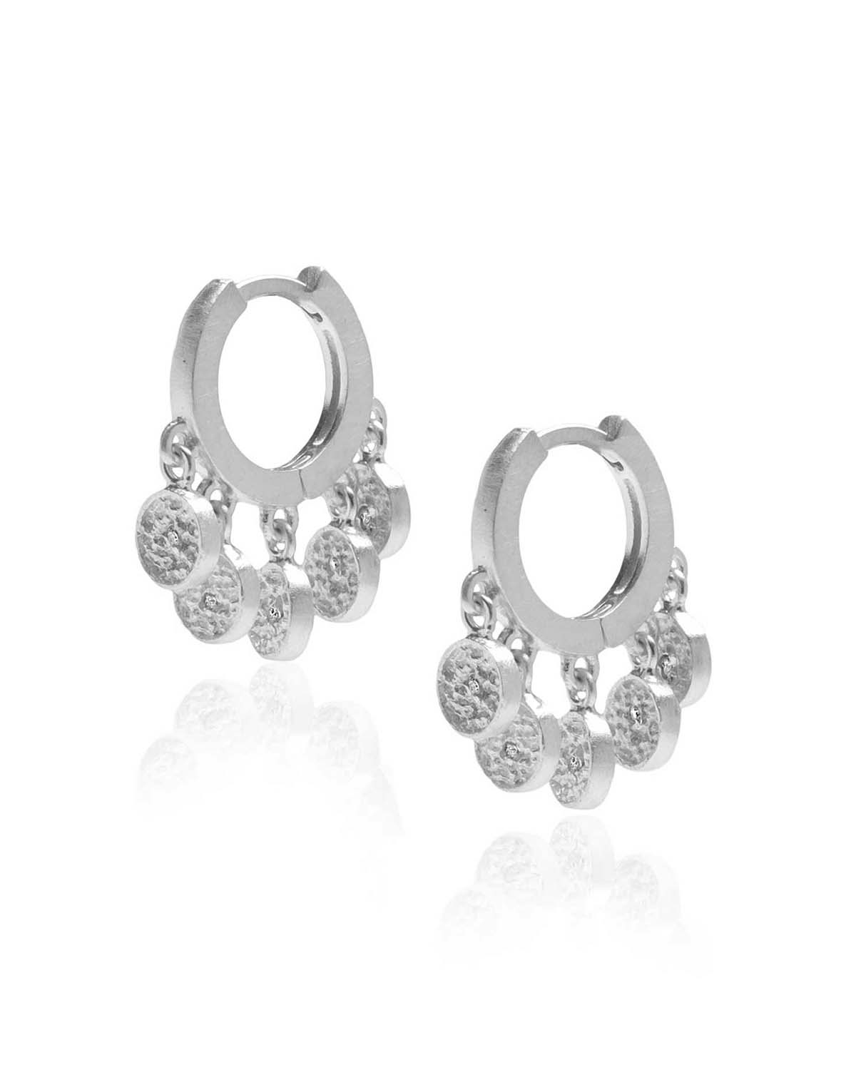 Silver mini hoop earrings with multiple crystal charms and a hammered finish