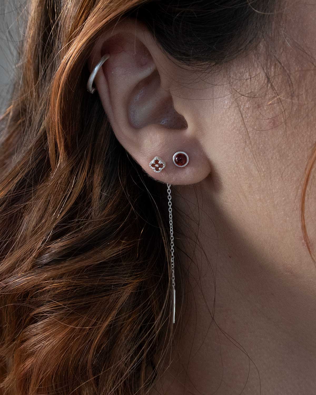 Rainbow moonstone stud earrings representing June birthstone energy