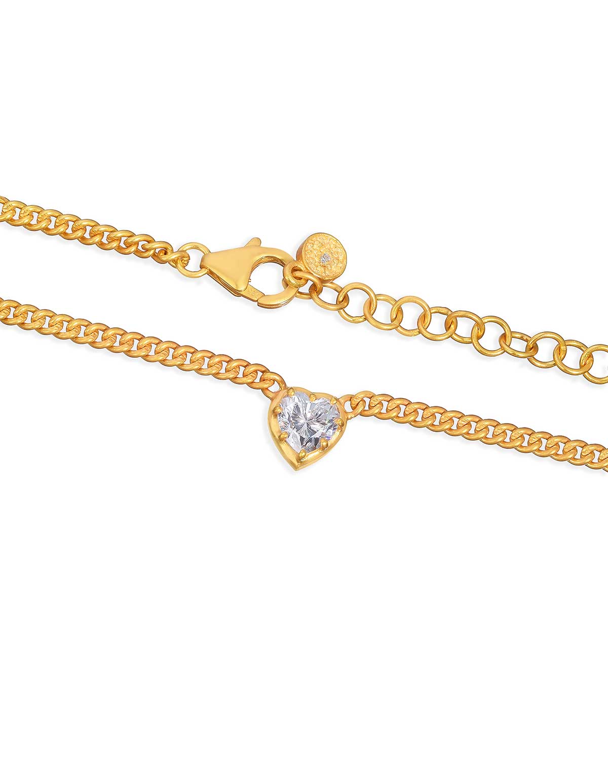 Gold necklace with diamond heart pendant featuring April’s birthstone, Moissanite