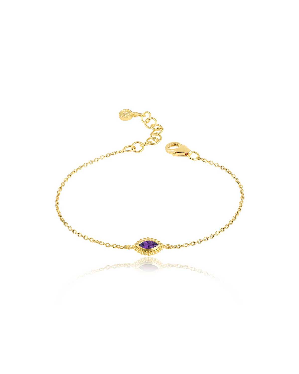 Detailed view of amethyst, garnet, and aqua gemstones in gold bracelet