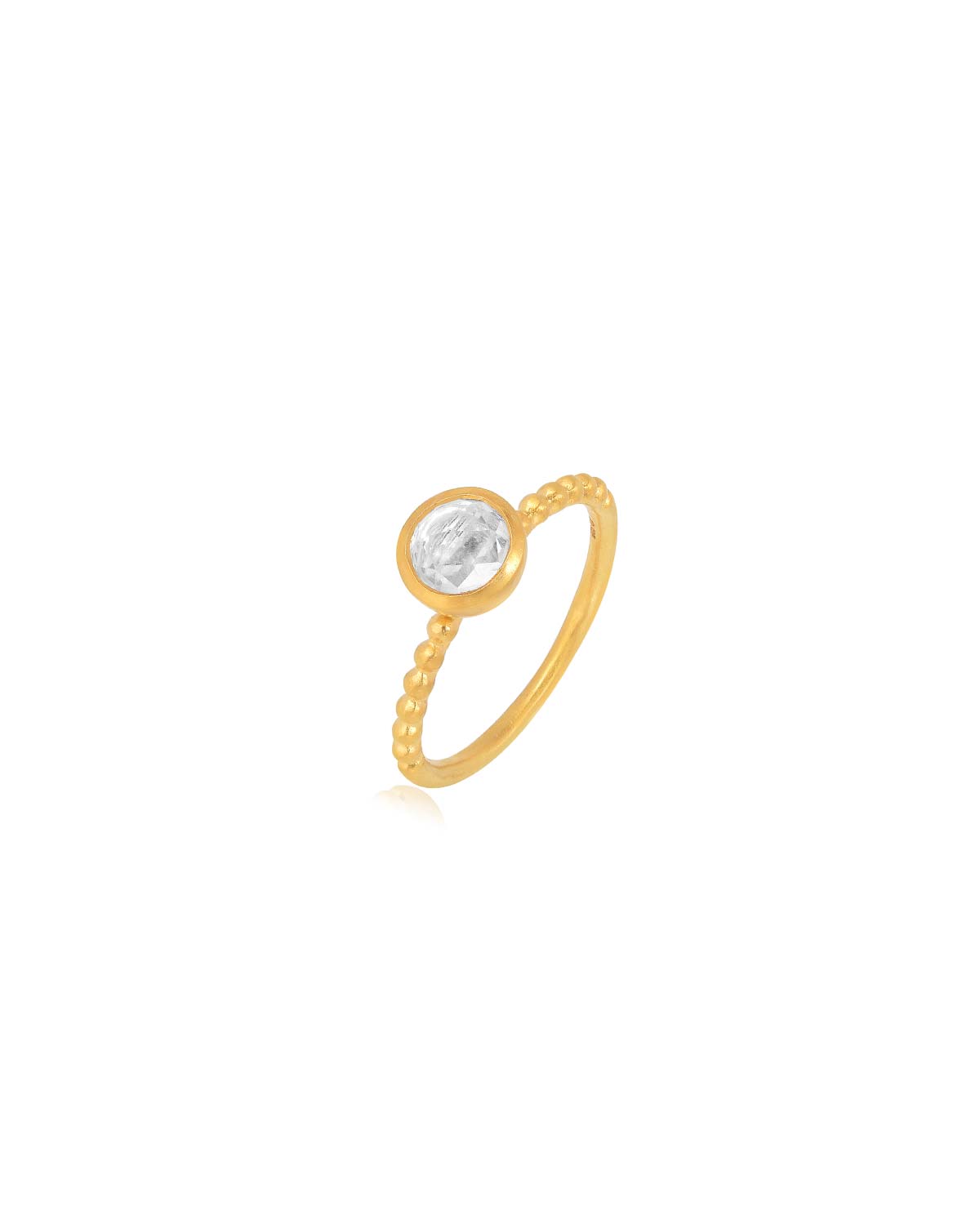 Handmade gold ring with a clear crystal and polished gold finish