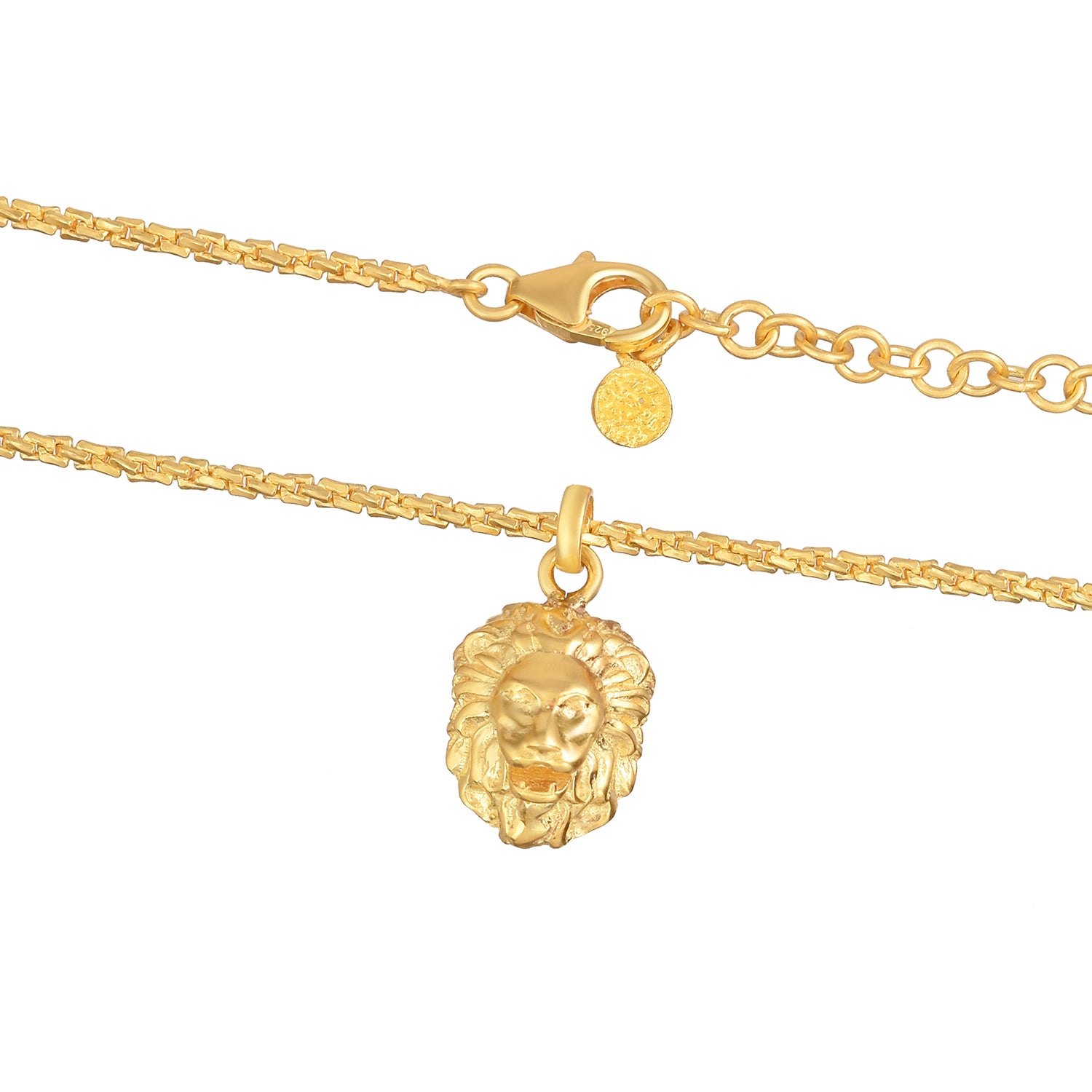 Close-up of a gold lion pendant necklace with textured chain details