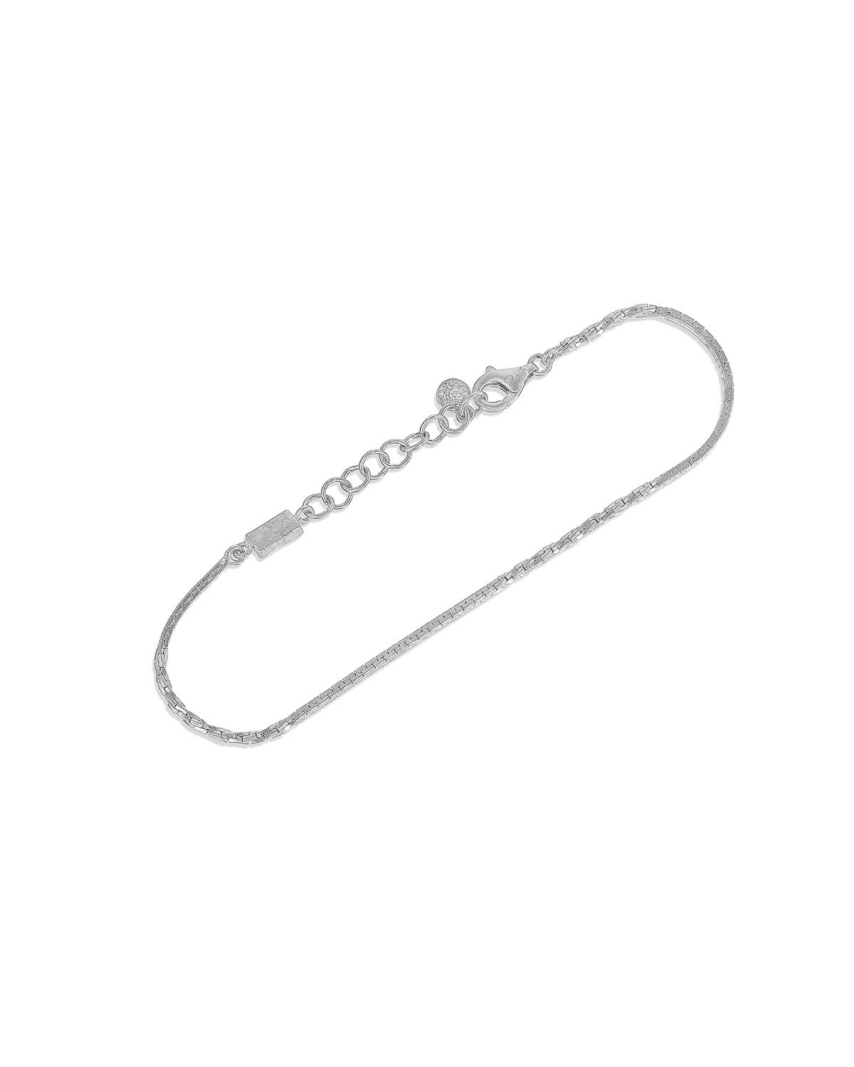 Detailed view of sterling silver bracelet with dual chain patterns and polished finish