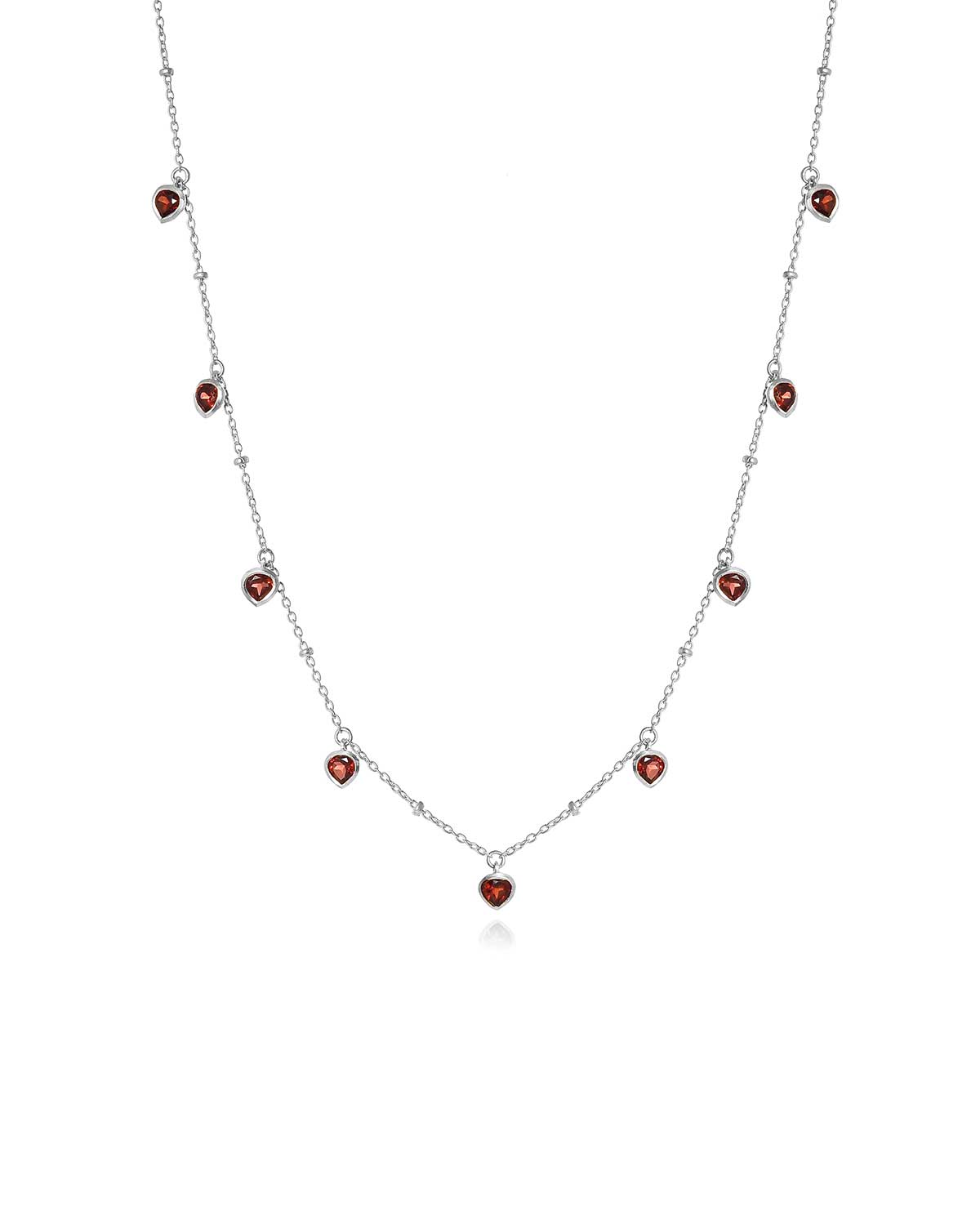 Sterling silver heart necklace with a garnet gemstone and adjustable chain