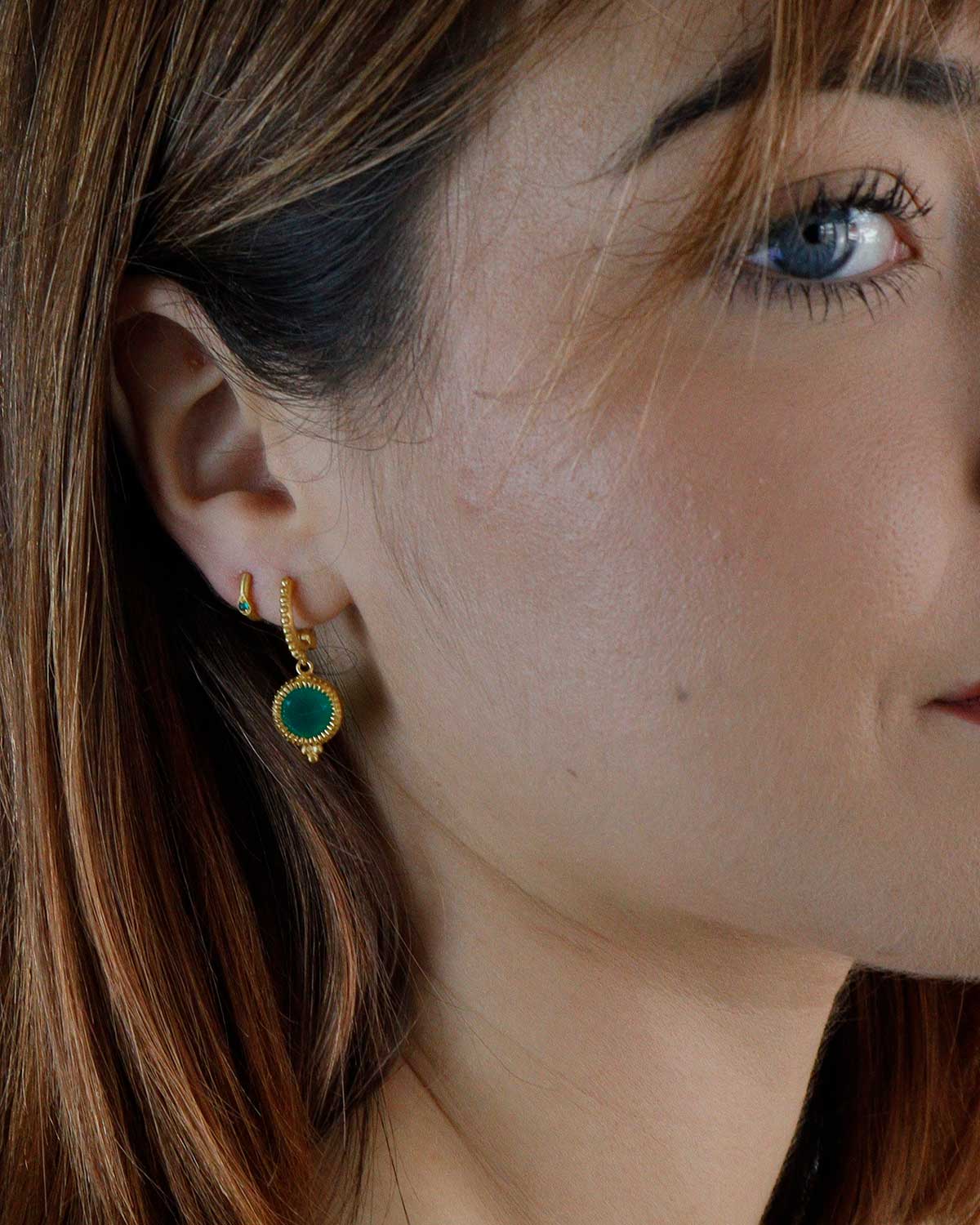 Gold mini hoop earrings with green onyx drop design