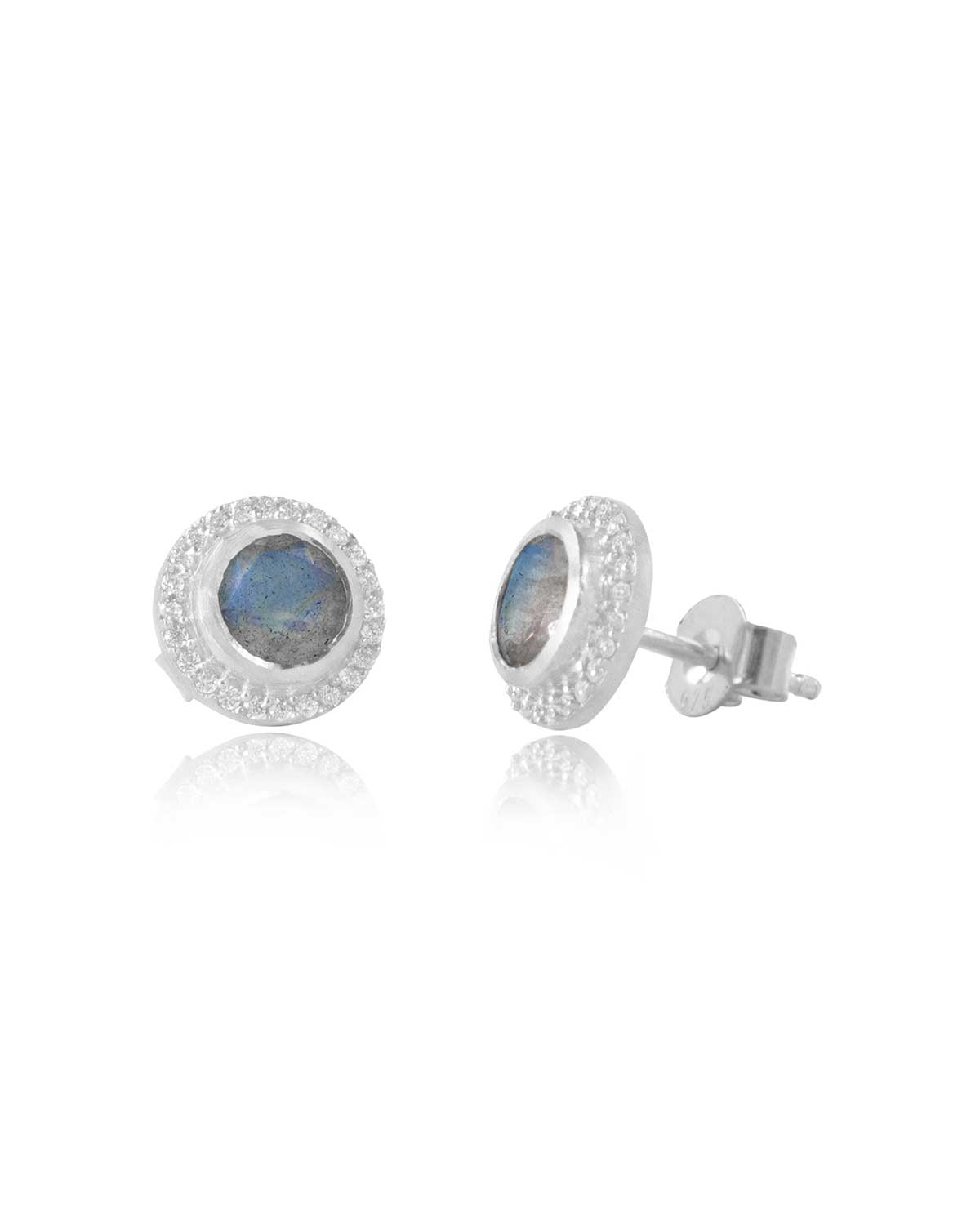 Close view of labradorite gemstone in silver stud earrings with crystal accents