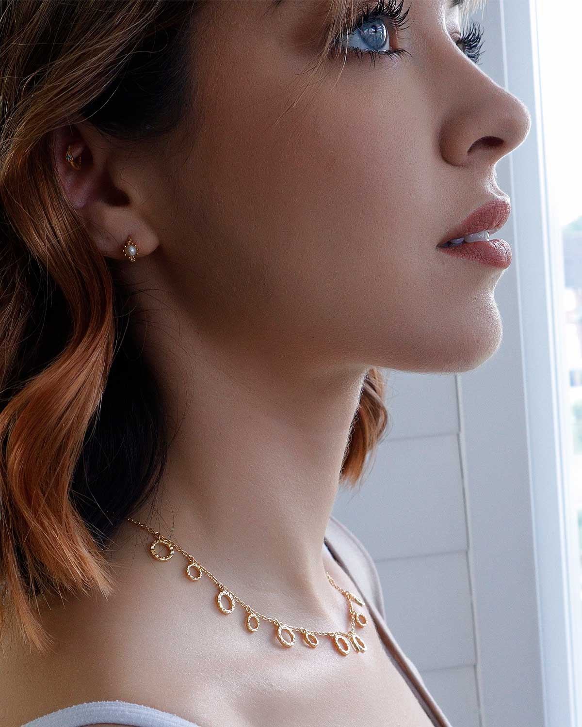 Mini gold hoops with pink amethyst, cubic zirconia and labradorite for positive energy