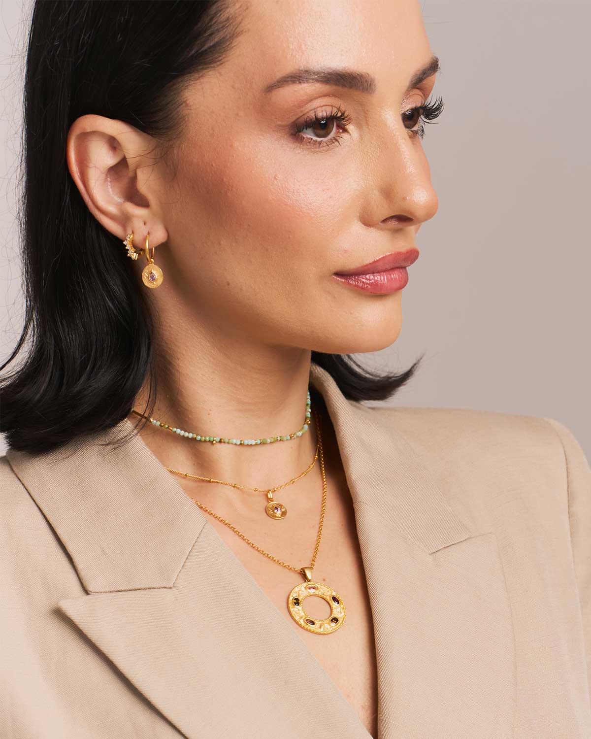 side view of gold adjustable necklace with Pink Amethyst birthstone pendant