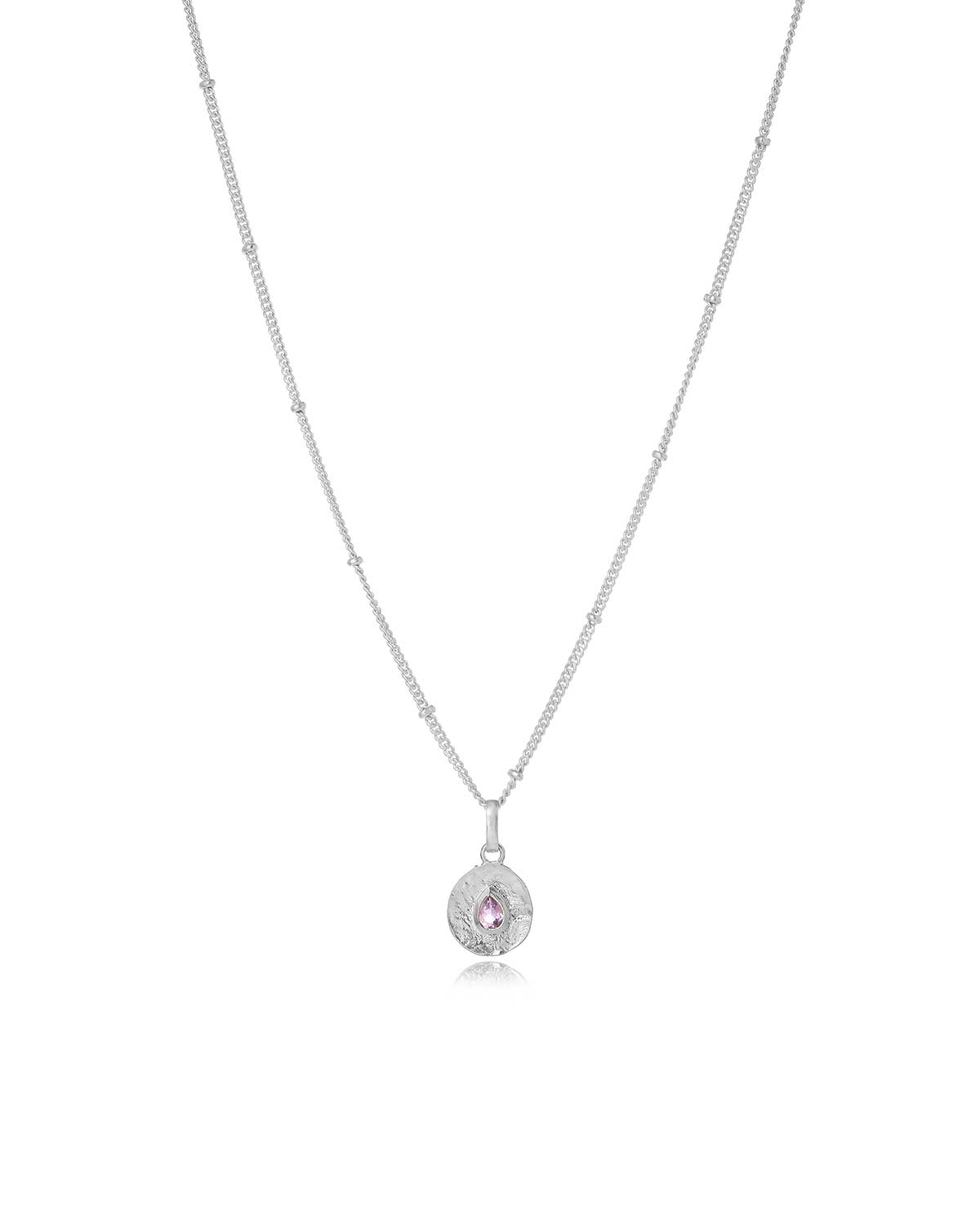 Necklace with a pendant featuring a pink amethyst gemstone