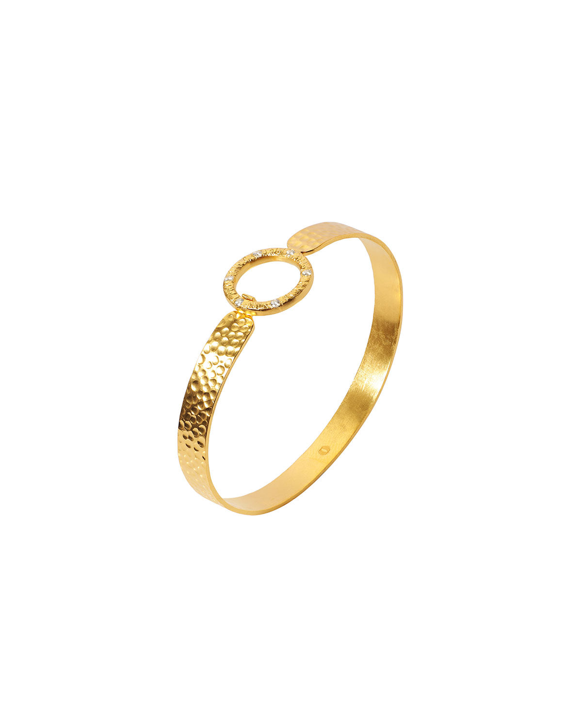 Flexible gold bangle with a hammered finish and gemstone detailing