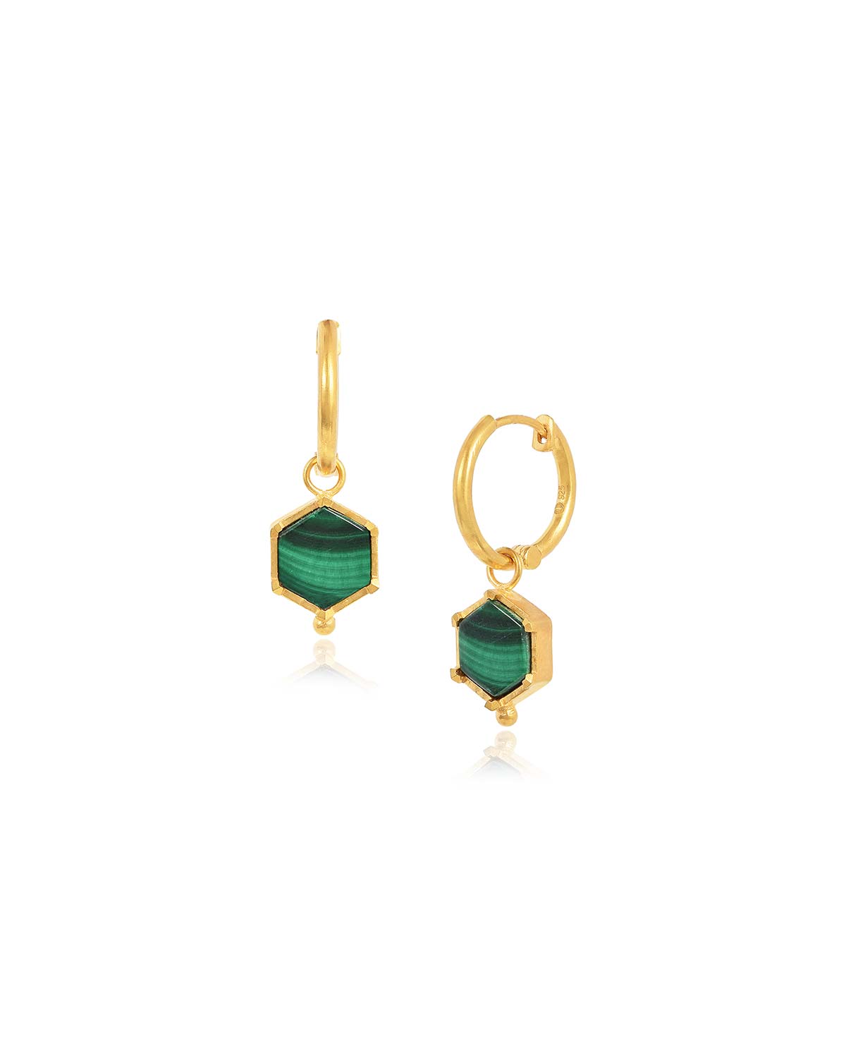 Gold mini hoop earrings with natural malachite gemstones styled with additional charms