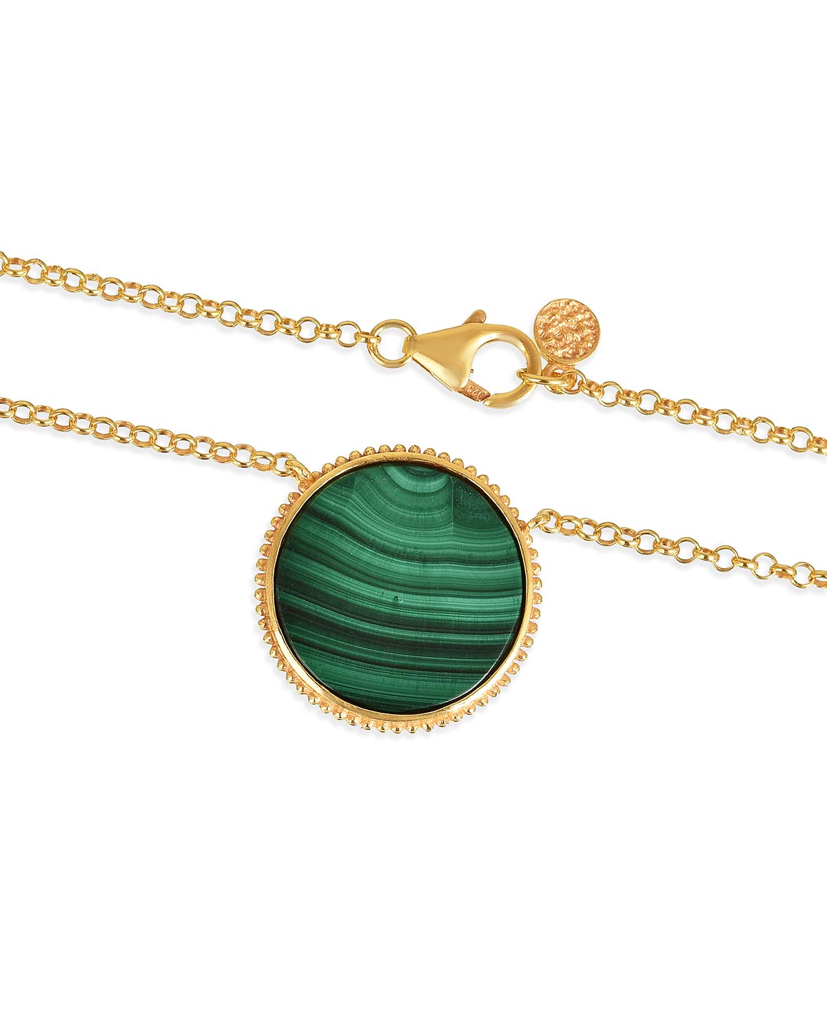 Gold necklace with malachite gemstone believed to absorb negative energies