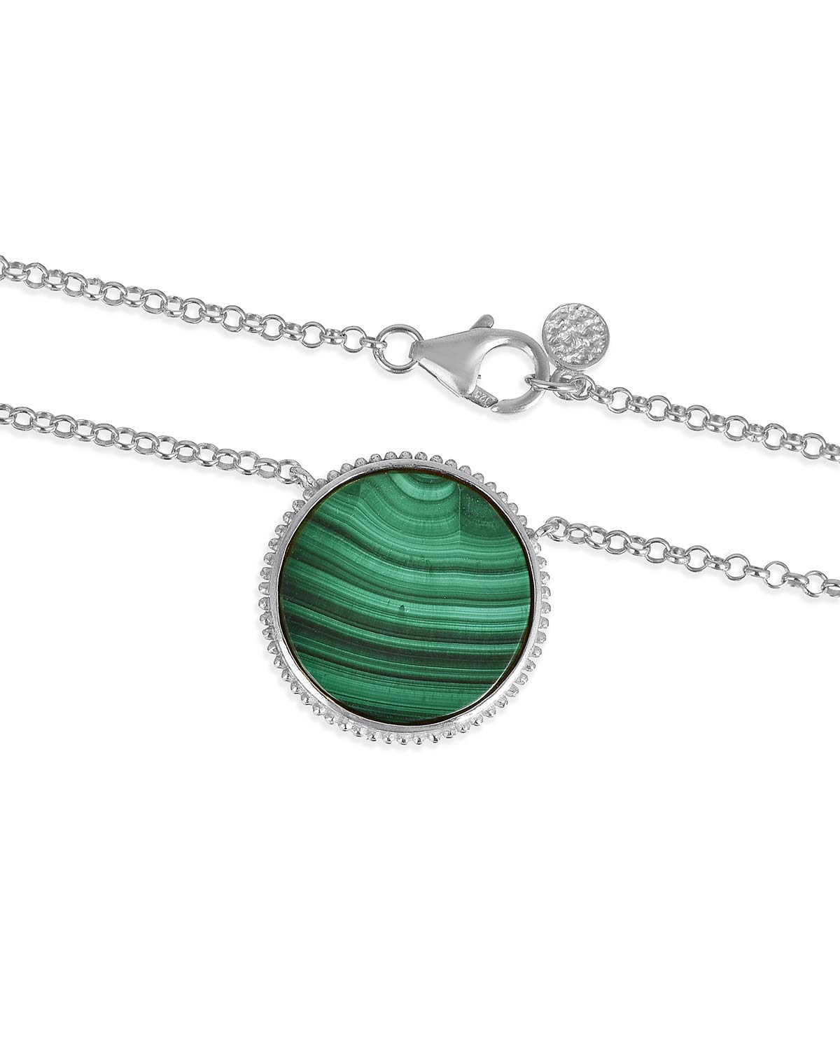 Close-up highlighting the natural wave texture of malachite on sterling silver necklace