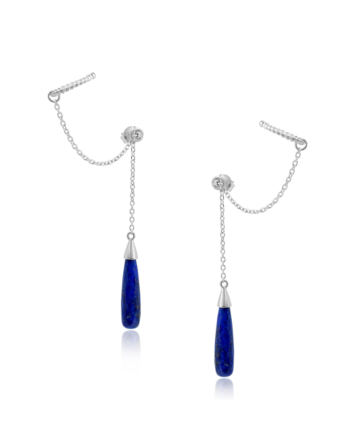 Close-up of sterling silver earrings with lapis lazuli gemstones