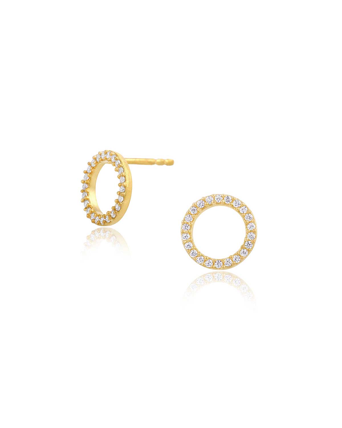 Circular gold stud earrings with tiny crystals and a matte finish