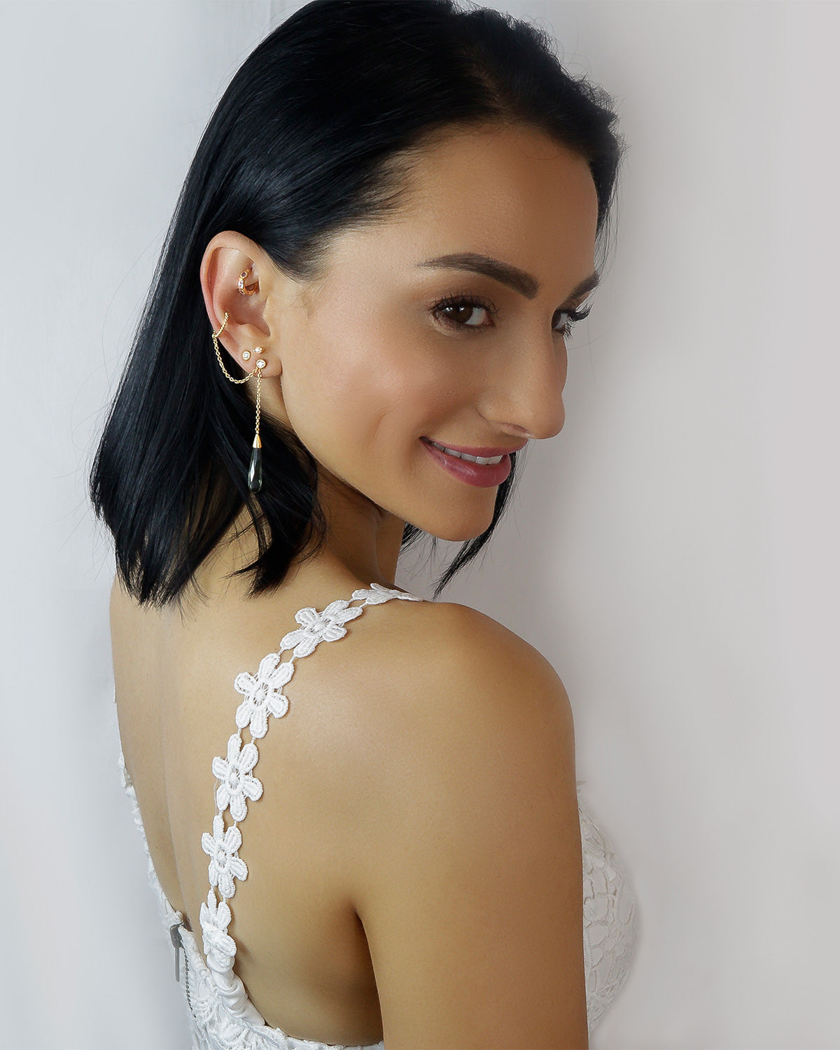 Model wearing green amethyst earrings in sterling silver