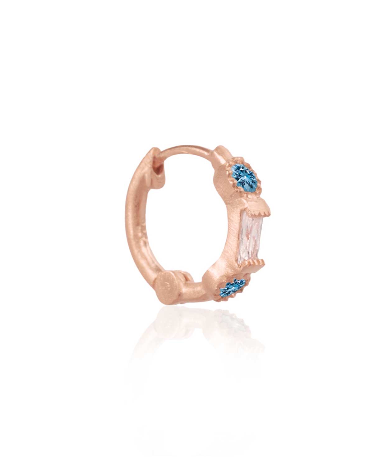 Delicate gold mini hoop earrings with blue topaz gemstones