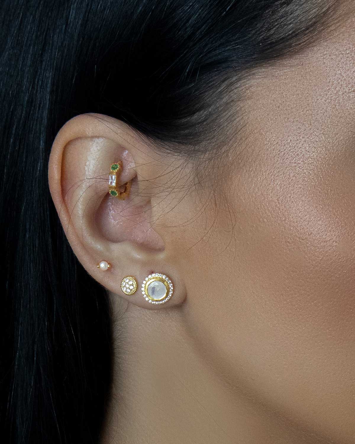 Delicate mini silver stud earrings with natural pearl