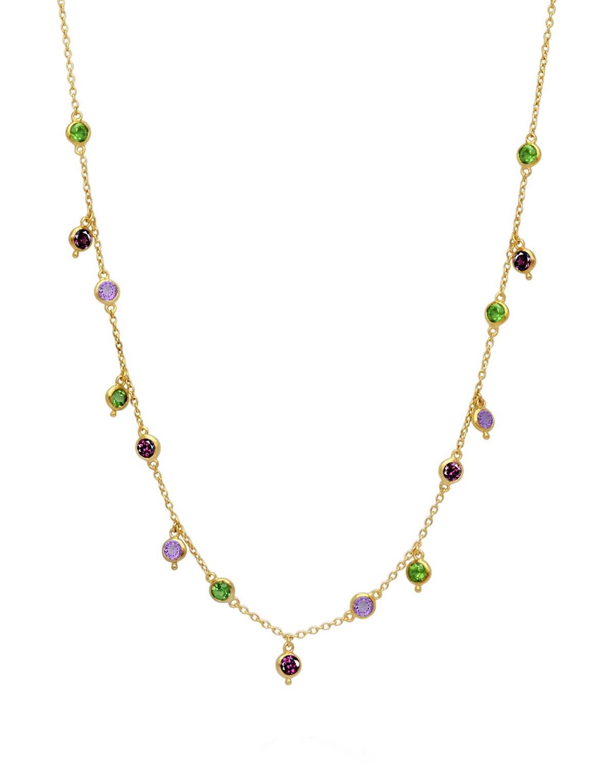 Gold necklace with rainbow moonstone and mixed gemstones in a delicate design