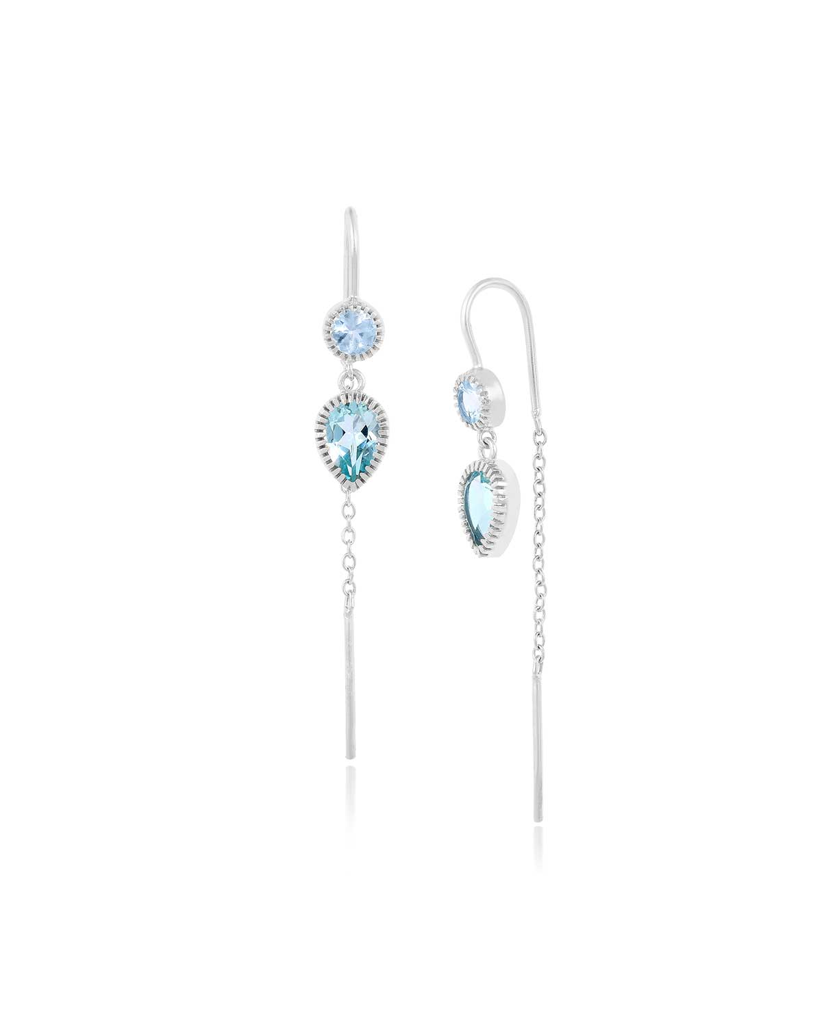 Pair of silver drop earrings with mixed-size blue gemstones