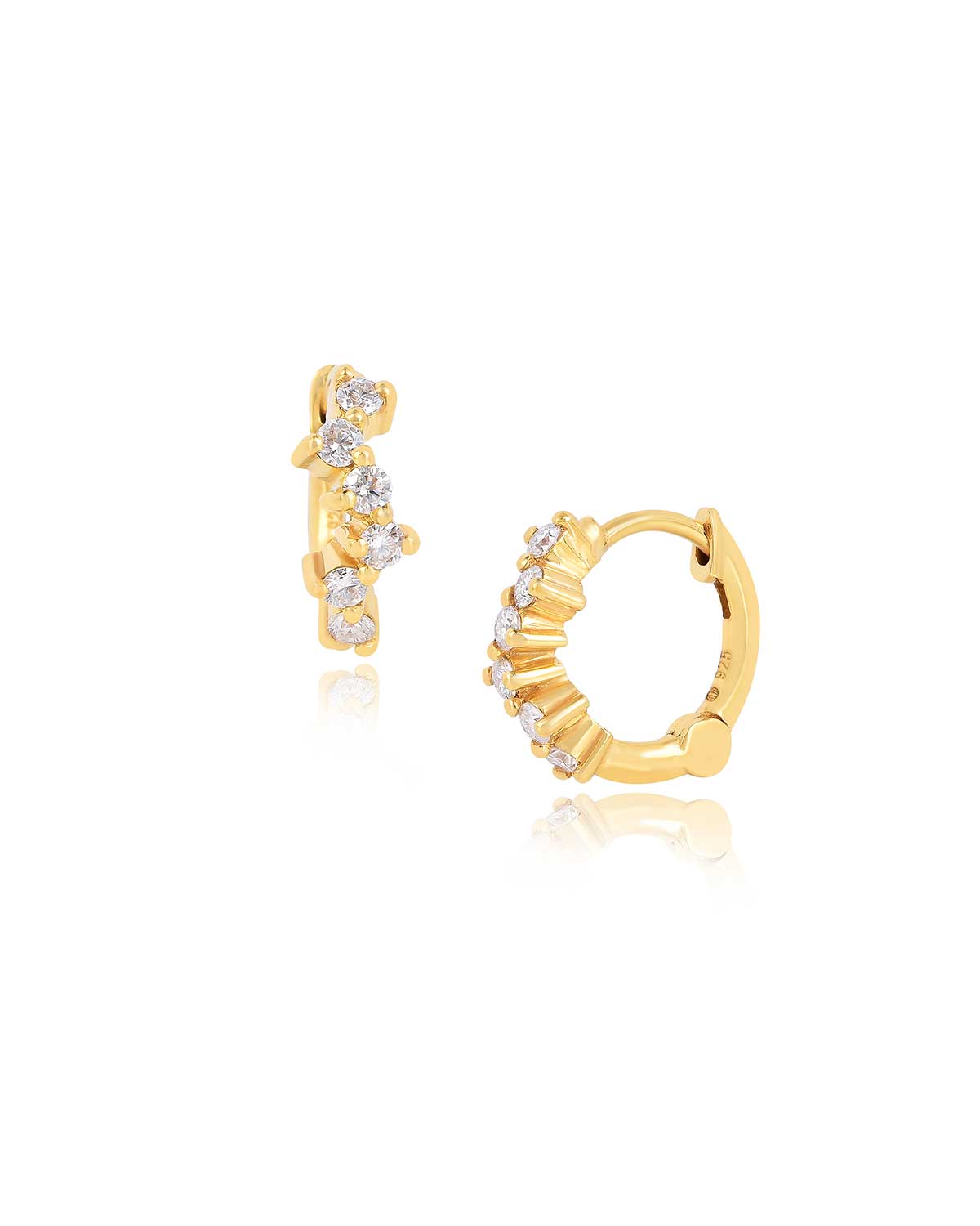 Gold hoop earrings with small diamond moissanite