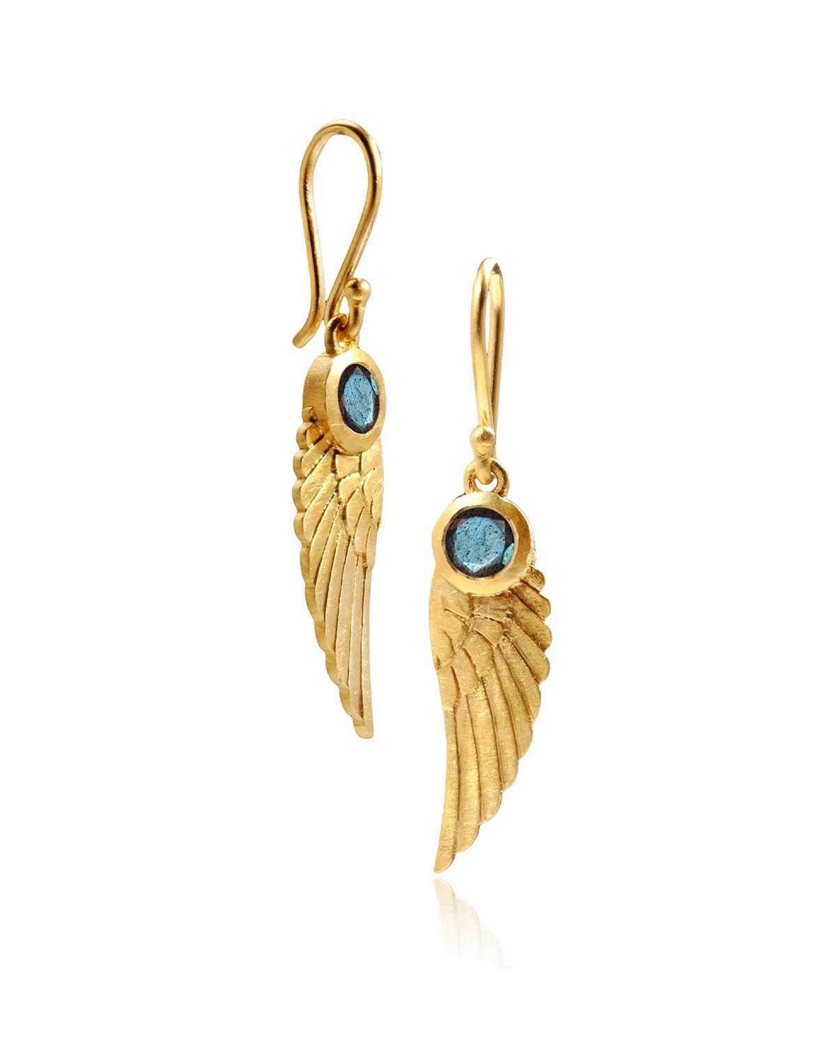 Blue topaz gemstone earrings in an angel wing design with gold plating