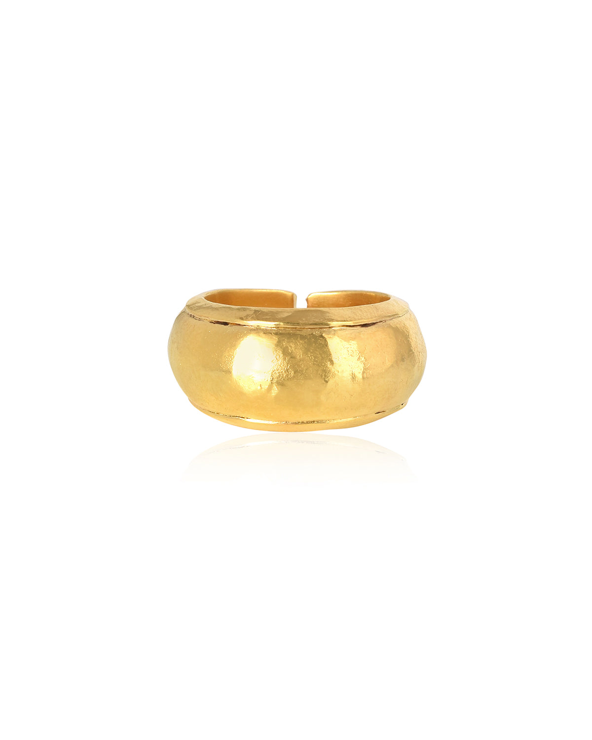 Gold ring with a polished textured finish and bold shape