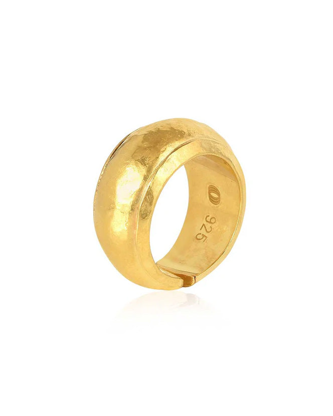 Chunky gold ring with a textured finish and hollow design