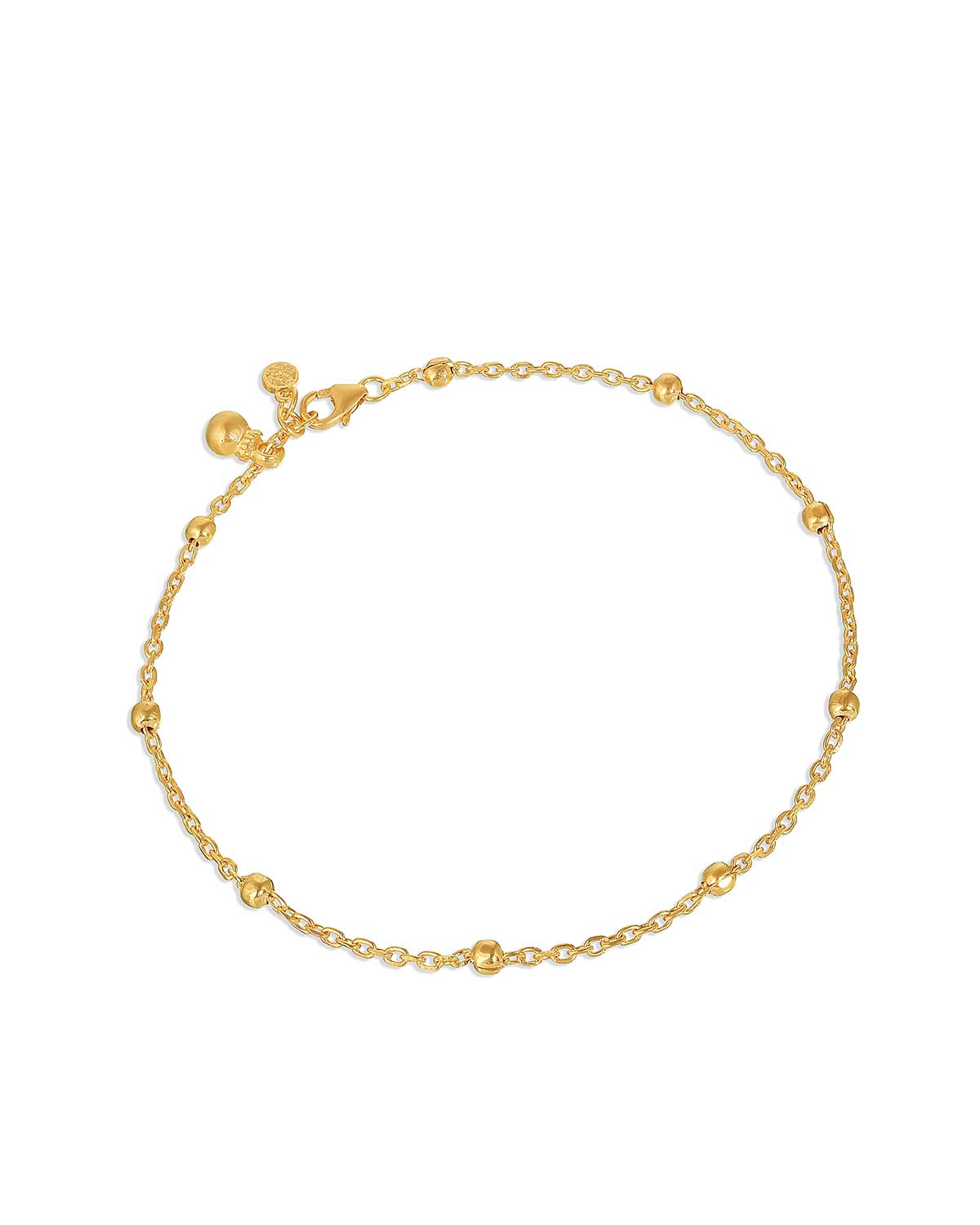 Gold adjustable anklet with a polished finish and delicate design