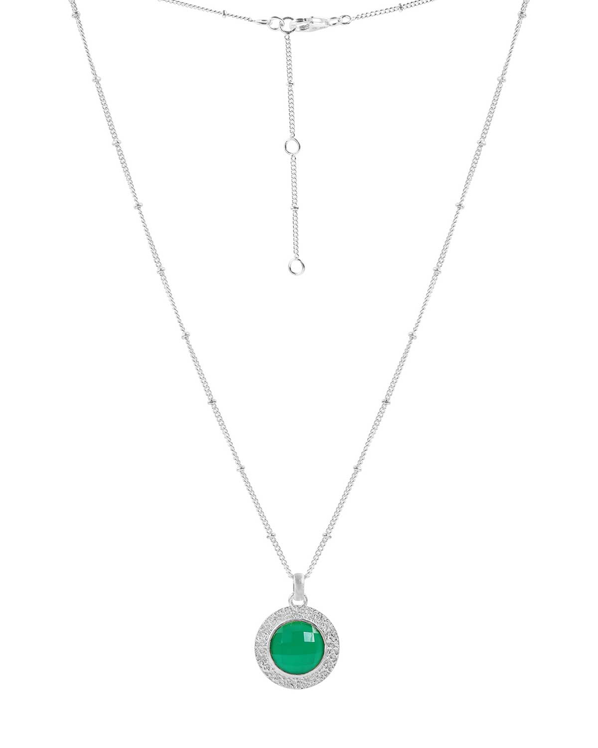 Silver necklace with circular green onyx pendant in a bold design