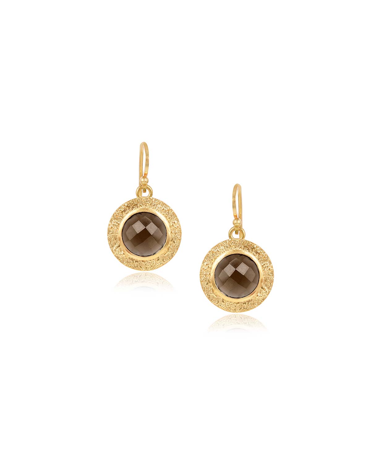 Bold gold earrings with circular smoky quartz gemstones and a polished finish