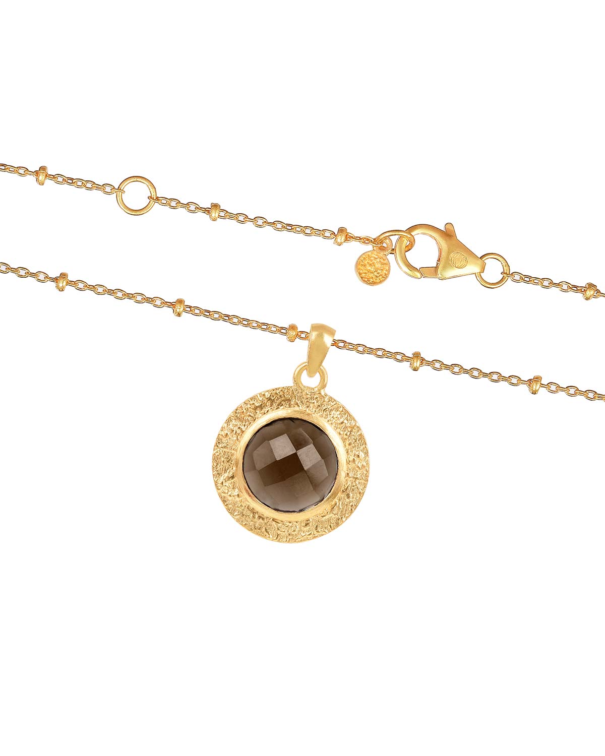 Bold gold necklace with a circular smoky quartz gemstone pendant