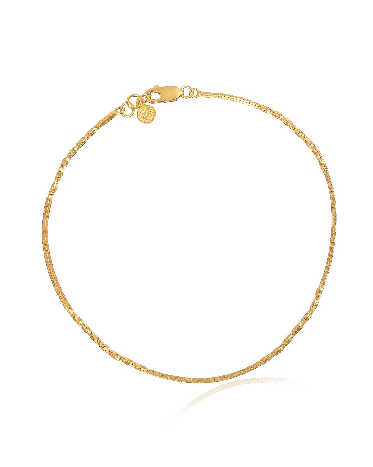 Gold adjustable anklet with contrasting textures and a polished finish