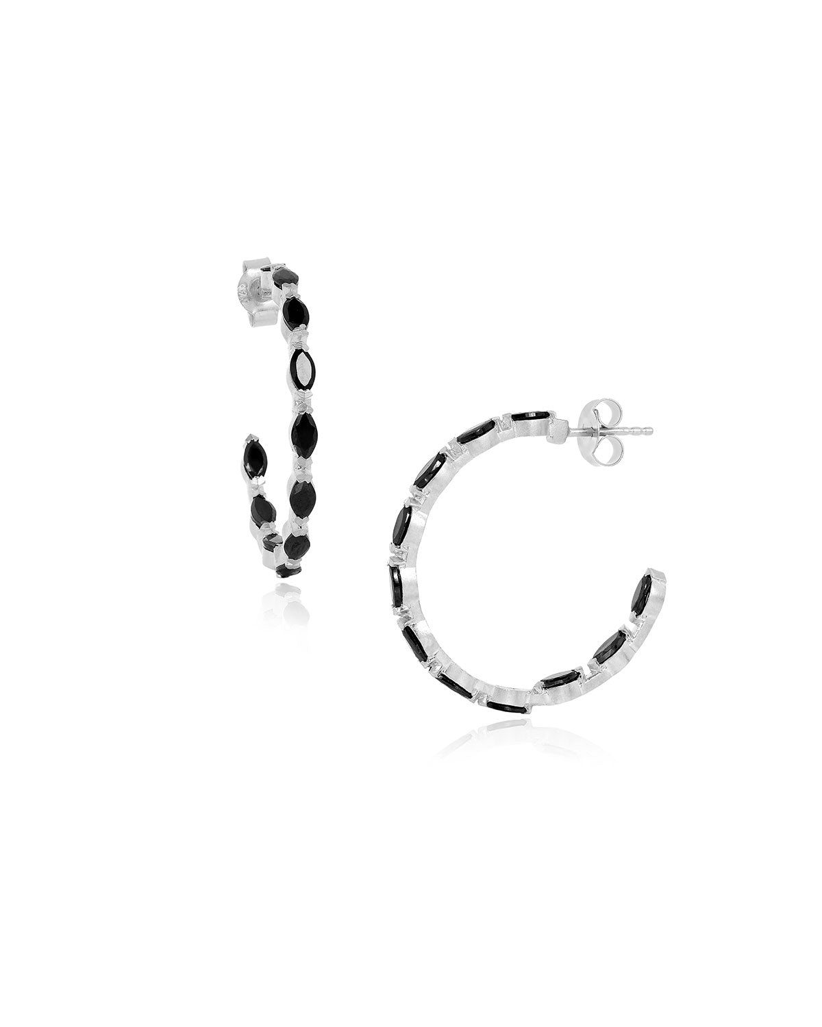 Angled front view of silver hoop earrings with marquise-cut black spinel gemstones