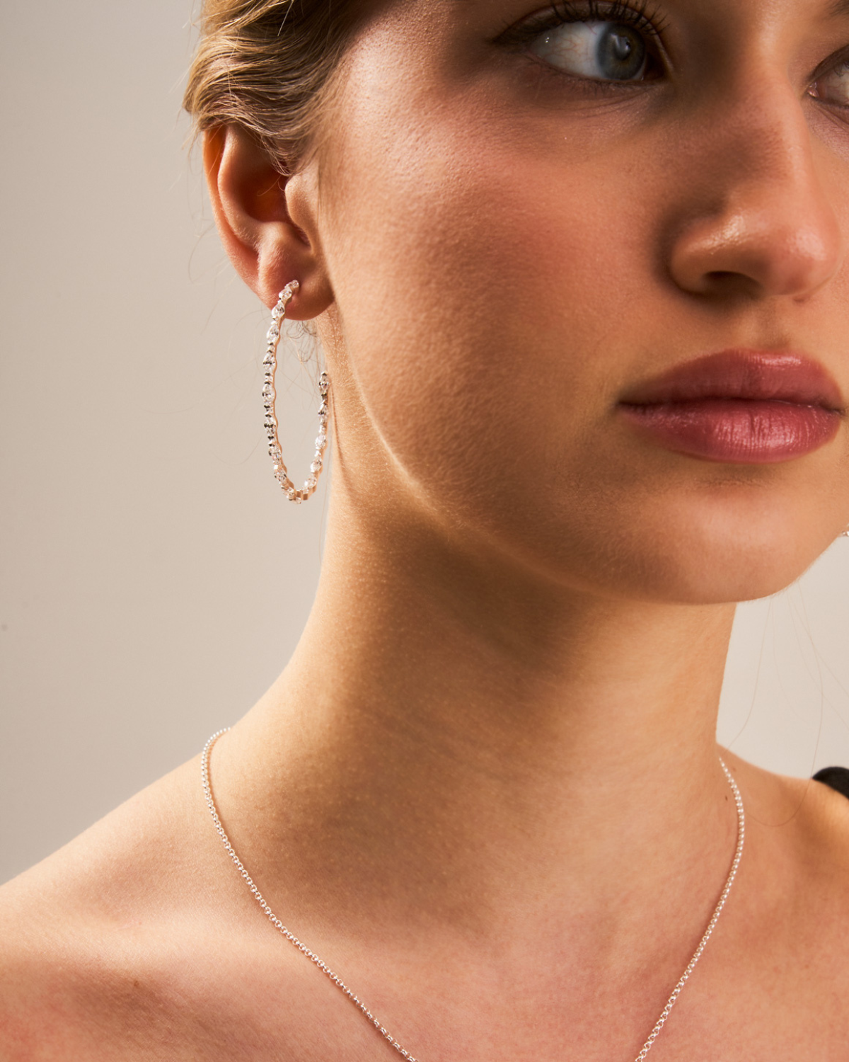 Large size silver hoop earrings with marquise-cut AAA zirconia stones