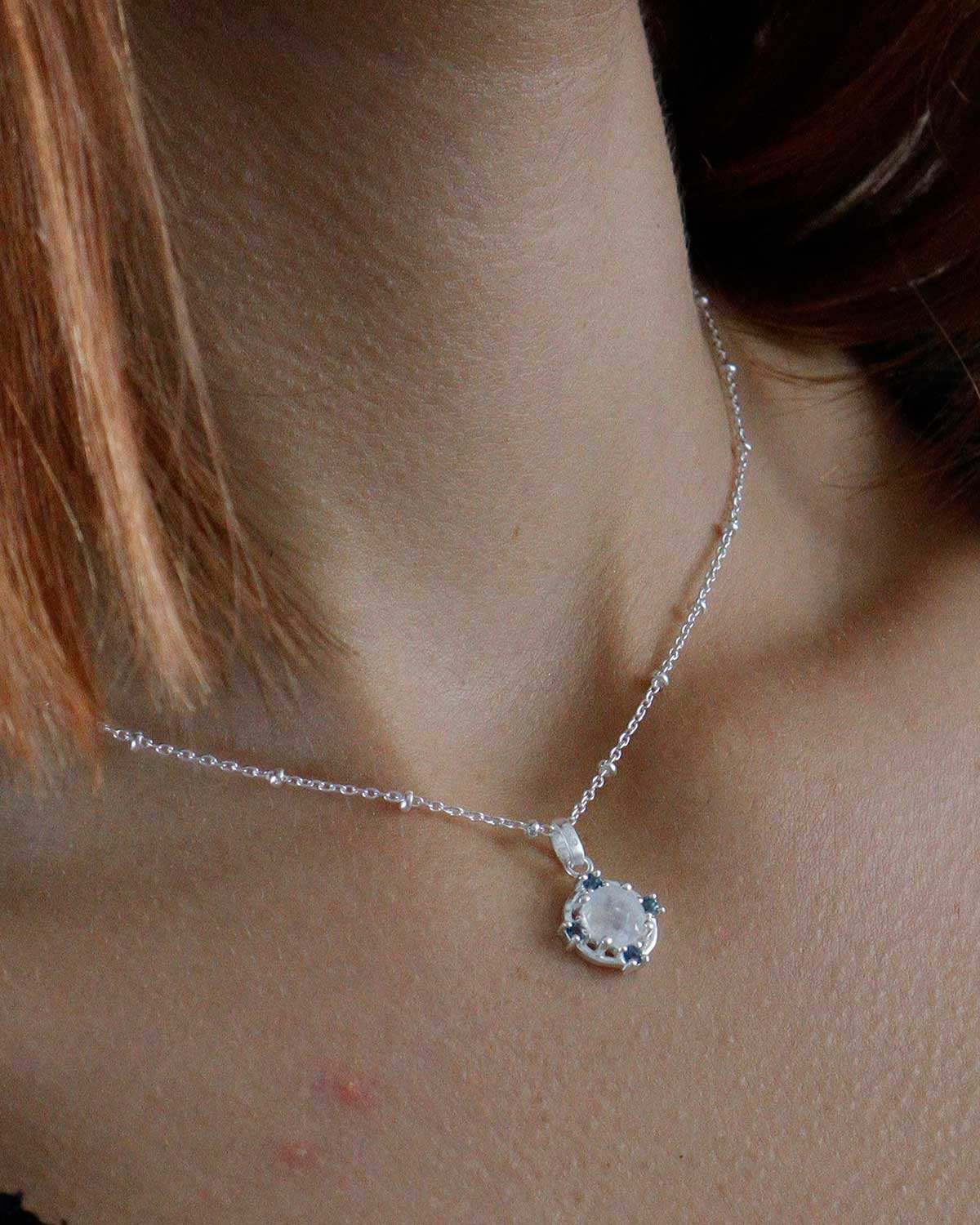 Silver necklace with polished finish and dual gemstones