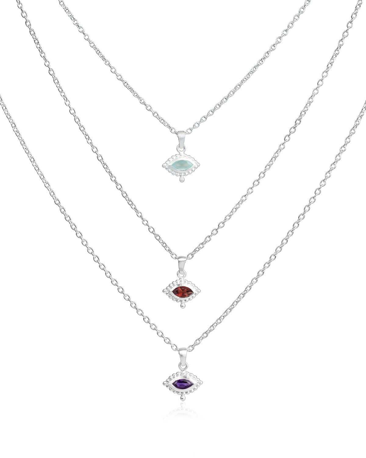 Everyday silver necklace with eye design and amethyst gemstone