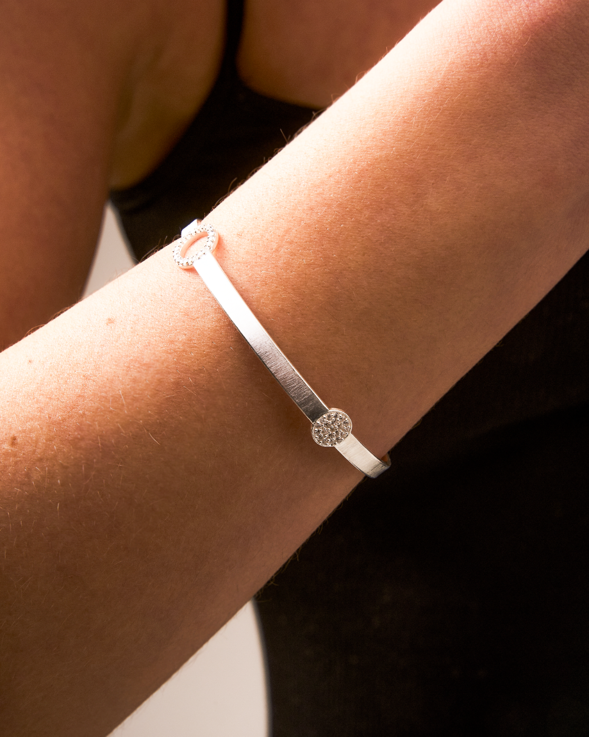 Close-up of sterling silver bangle with fine AAA grade crystals