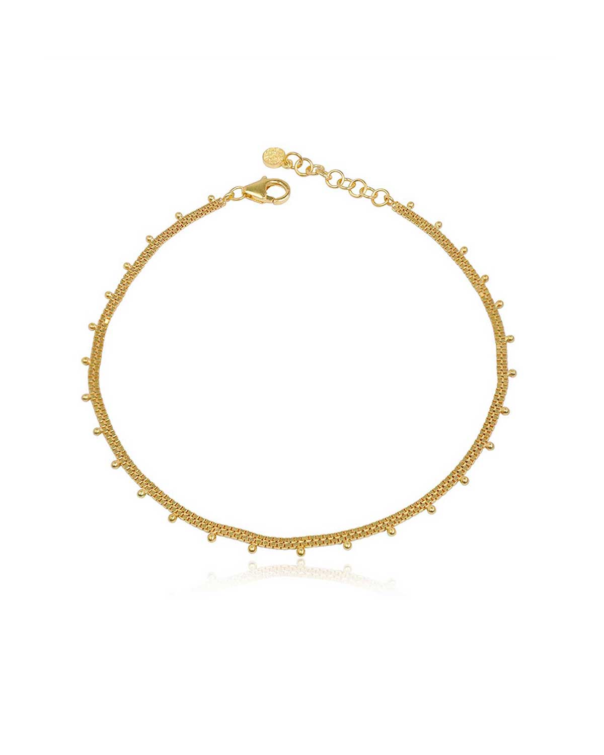 Gold anklet with delicate bead details and a polished finish