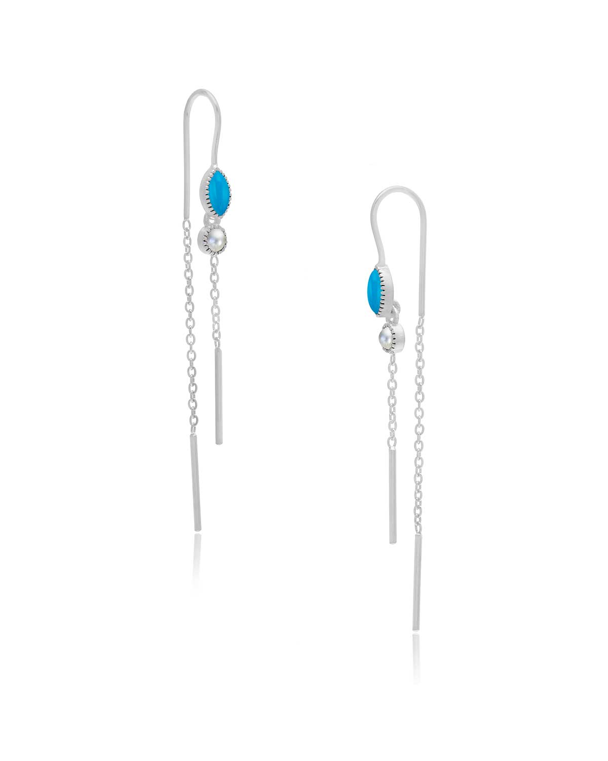 Front view of silver drop earrings with moonstone and blue topaz