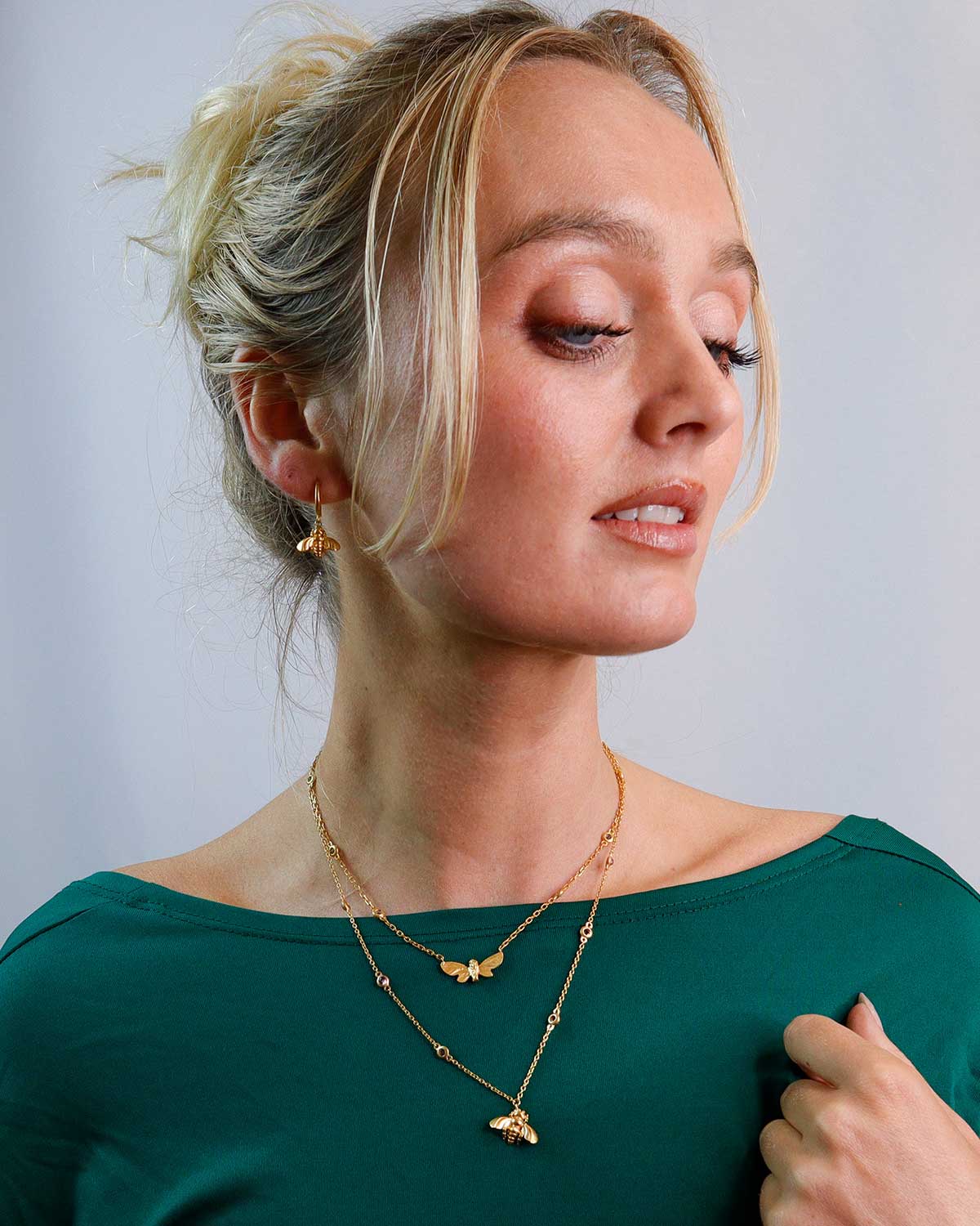 Front view of bee pendant necklace in gold vermeil with gemstone accents