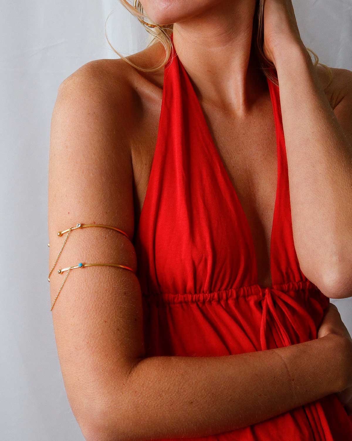 Model wearing Gemstone Gold Arm Cuff
