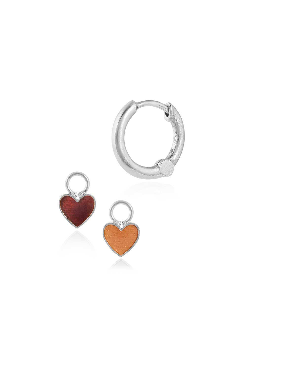 Silver mini hoop earrings with reversible enamel heart charms in lipstick-inspired colours