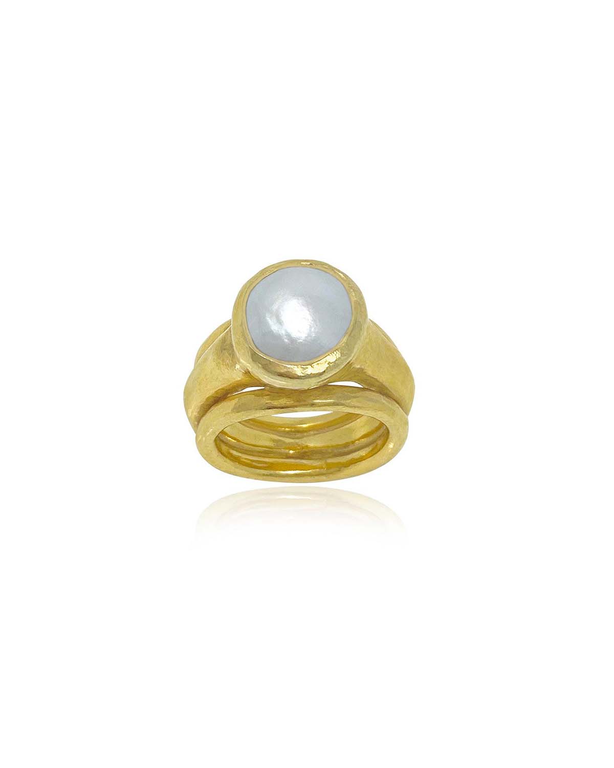 Gold ring with natural baroque pearl and polished finish