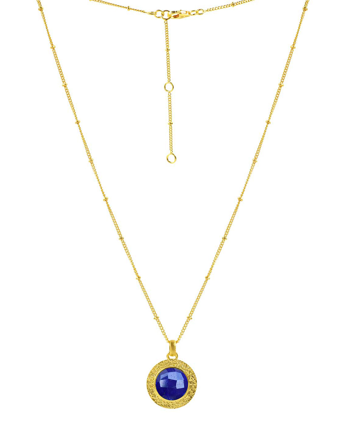 Gold vermeil necklace with a circular lapis lazuli pendant in deep blue