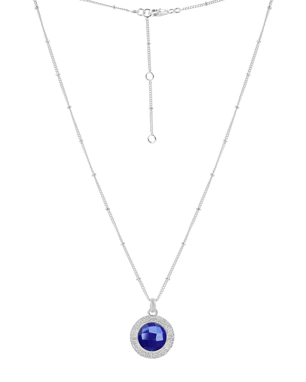 Sterling silver necklace with a circular lapis lazuli gemstone pendant