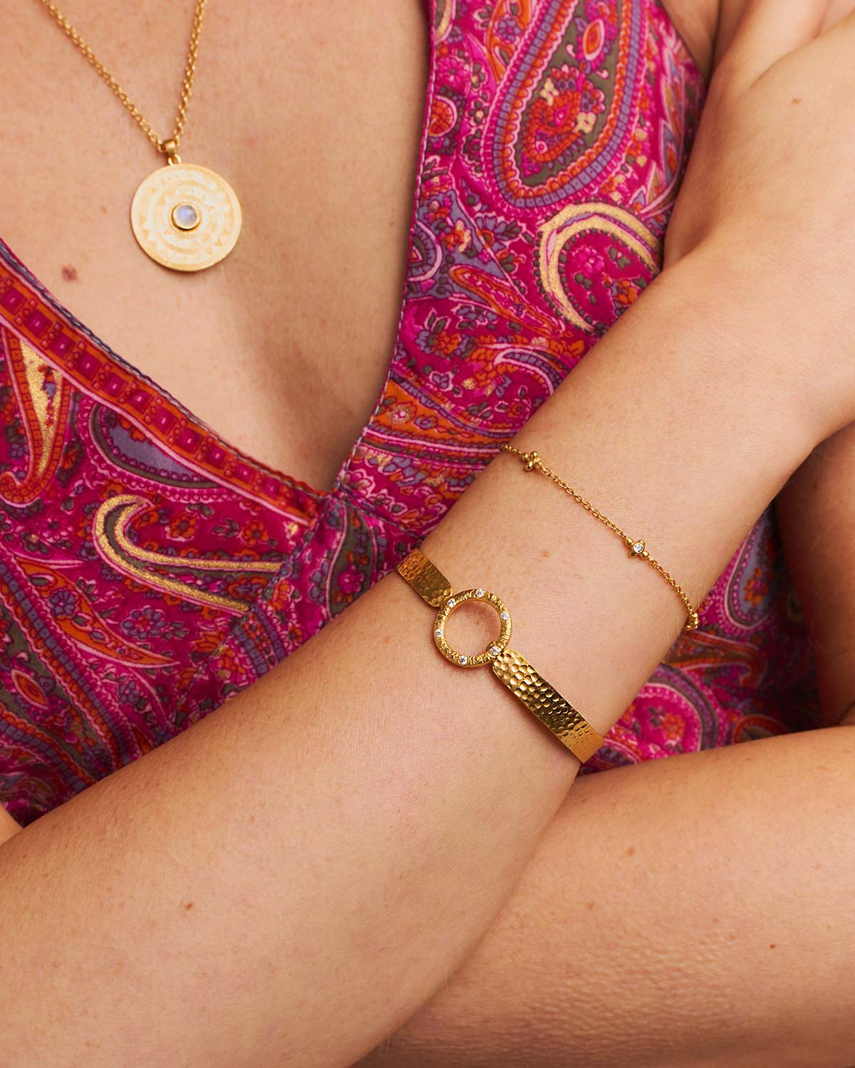 Gold bracelet featuring blue topaz and diamond birthstone details